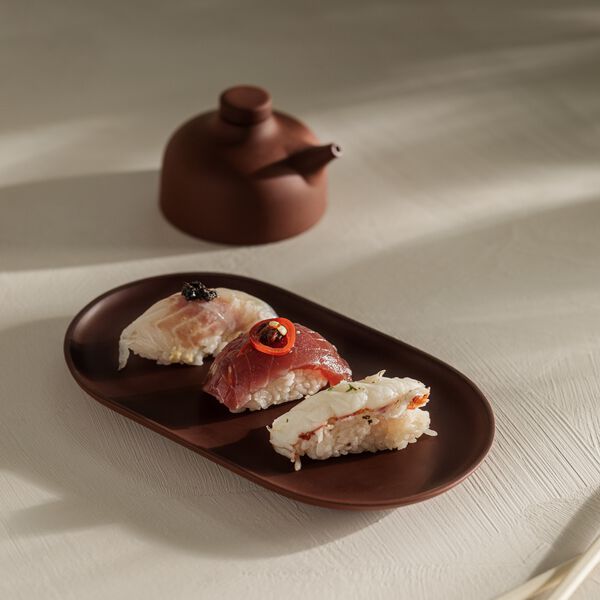 Sandgeheimnisse Platte, roter Ton, Design House Stockholm